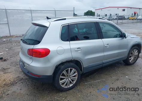 2014 Volkswagen Tiguan Sel z USA, uszkodzony, nr VIN WVGBV3AX0EW599313
